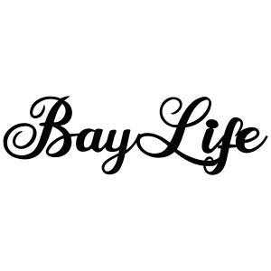 Large steel wall art with the words 'Bay Life' cut out in an elegant cursive font. Painted black, it features smooth lines capturing a coastal theme.